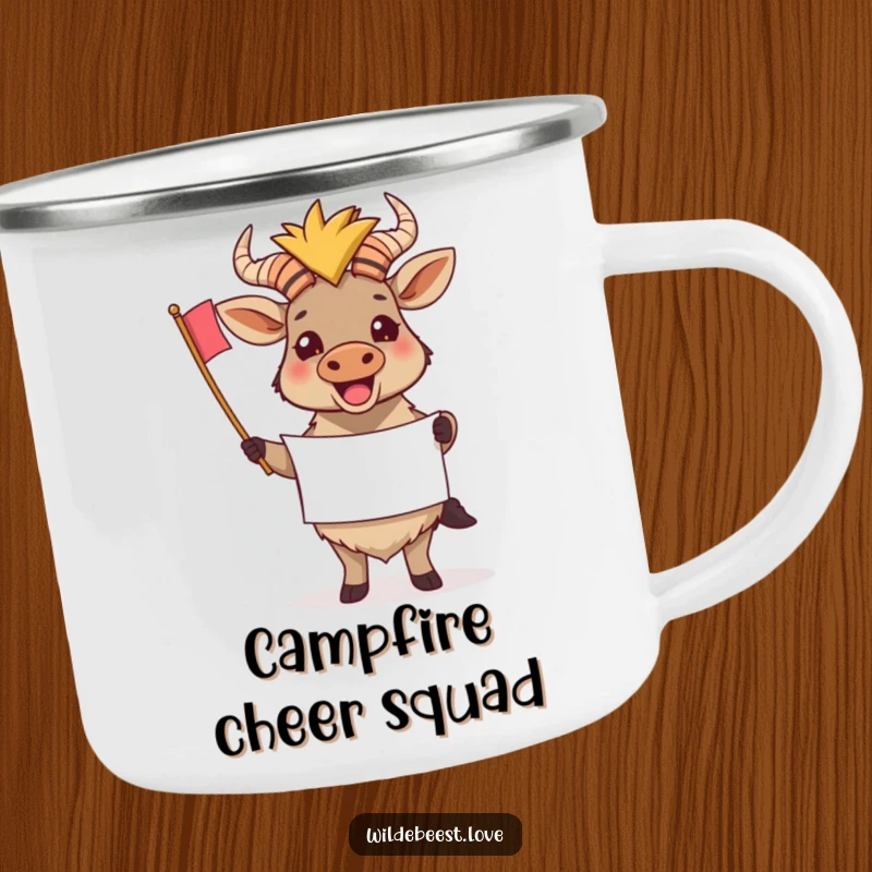 Funny Wildebeest Camping Mug: Durable mug with a cheering wildebeest holding a tiny banner, perfect for celebrating outdoors, a funny gift.