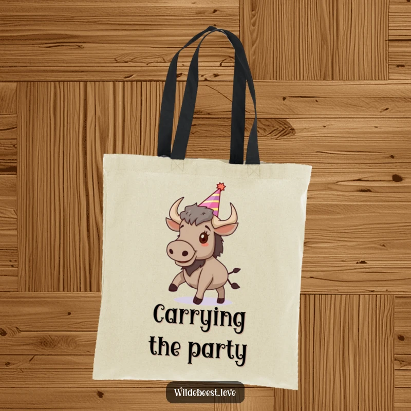 Funny Wildebeest Tote Bag: A vibrant tote bag showing a happy, bouncing wildebeest with a party hat, ideal for party-goers, a funny gift.